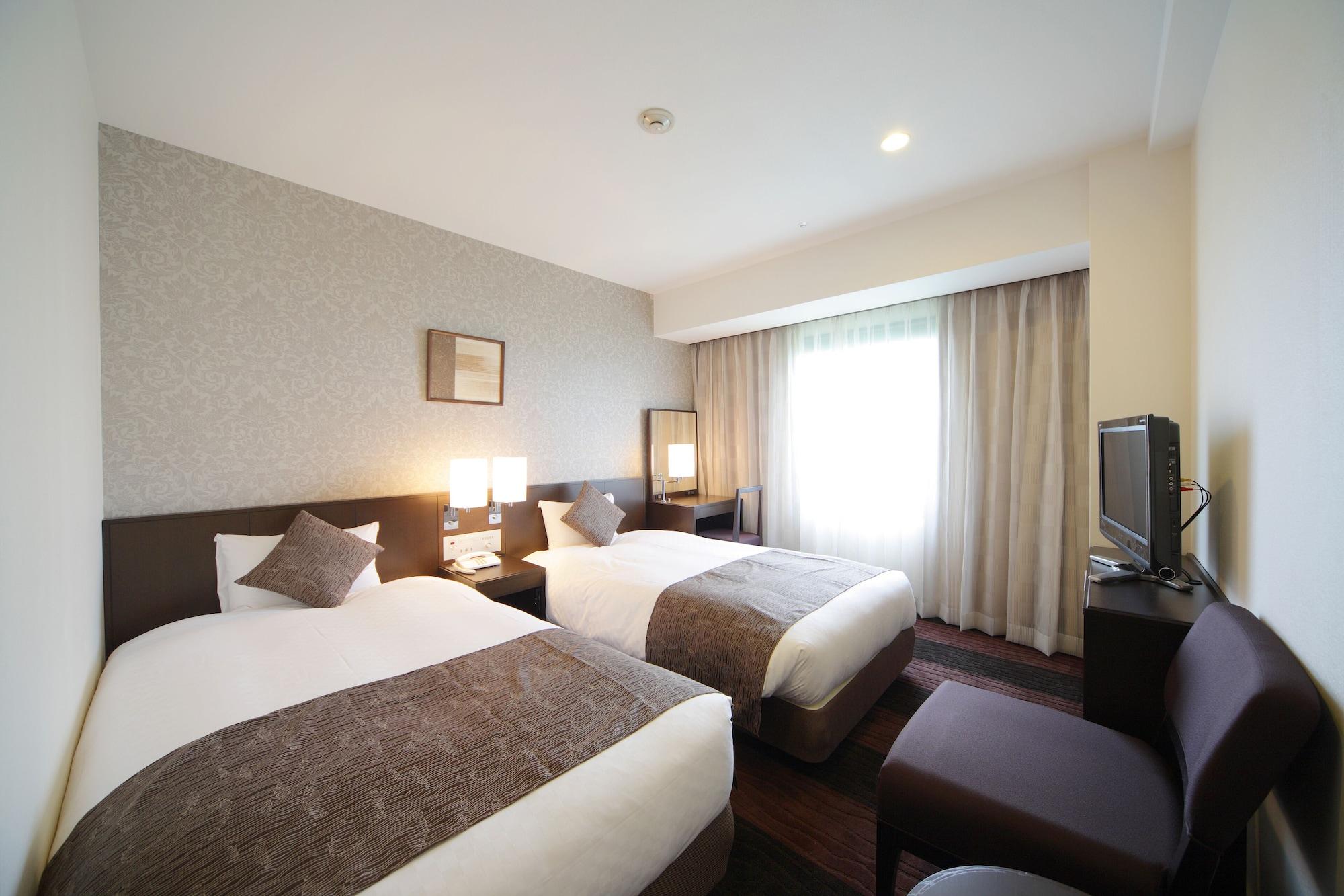 Hotel Granvia Wakayama Exterior photo A room at the hotel