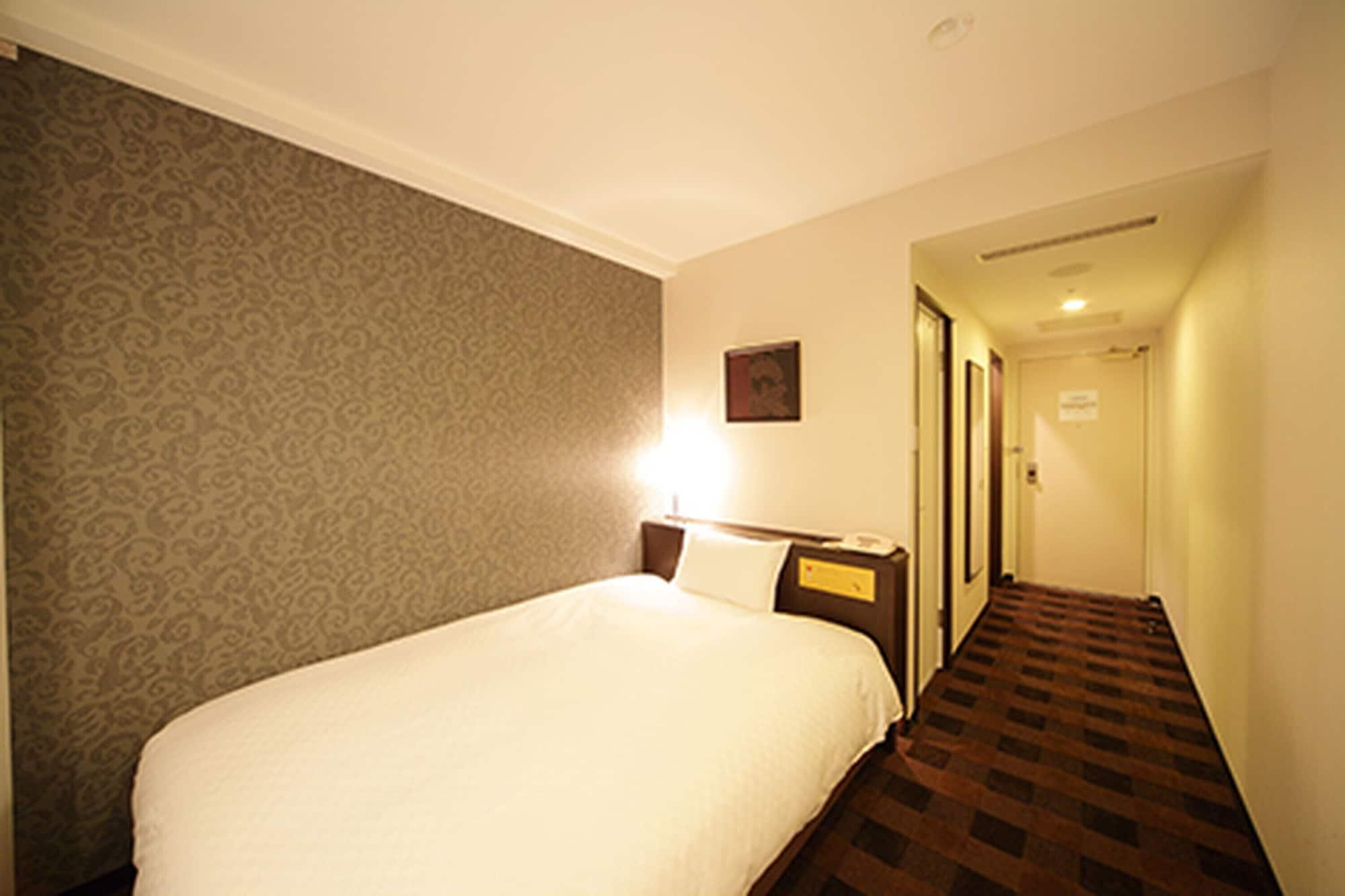 Hotel Granvia Wakayama Exterior photo A single room at a hotel in Japan