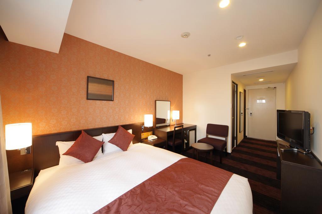 Hotel Granvia Wakayama Exterior photo A room at the hotel
